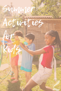 Picture of kids squirting water on a hot summer day for a list of the best summer activities in minnesota
